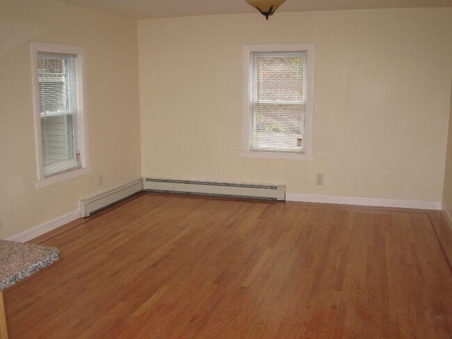 Building Photo - No Brokers Fee, Parking Included, Porch, Eat-in Kitchen, Laundry on a Site