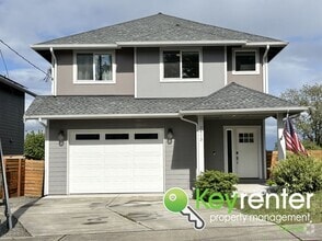Building Photo - Stylish 4-Bedroom Home with Finished Basem...
