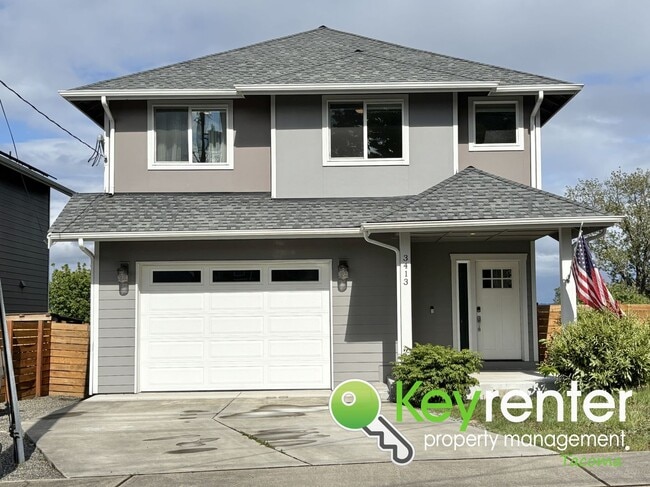 Primary Photo - Stylish 4-Bedroom Home with Finished Basem...