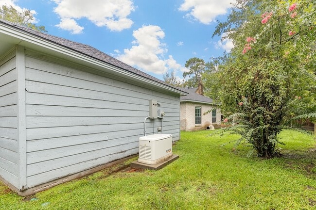 Building Photo - 5622 Woodland Creek Dr