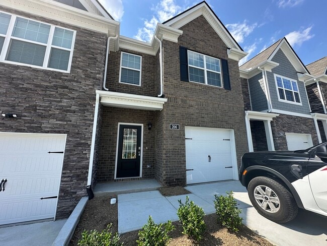 Building Photo - Brand New Construction Townhome with Pool!