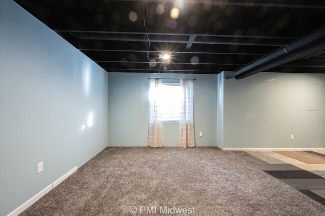 Building Photo - "Spacious 4-Bedroom Gem with Finished Base...