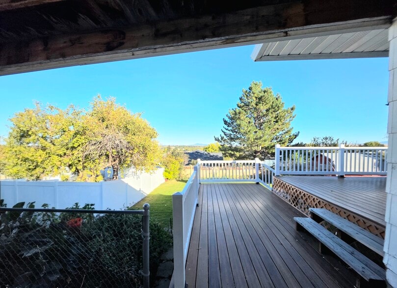 View of lower deck from carport - 1409 2nd West Hill Dr
