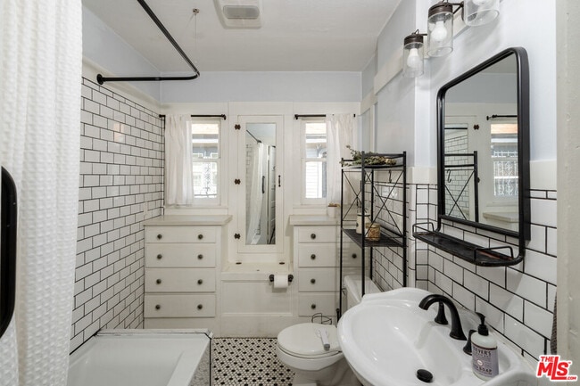 Building Photo - 5742 6th Ave