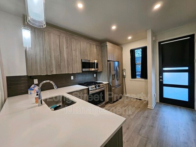 Building Photo - 7334 N Curtis Ave