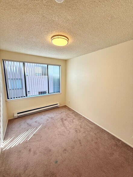 Building Photo - 4259 8th Ave NE