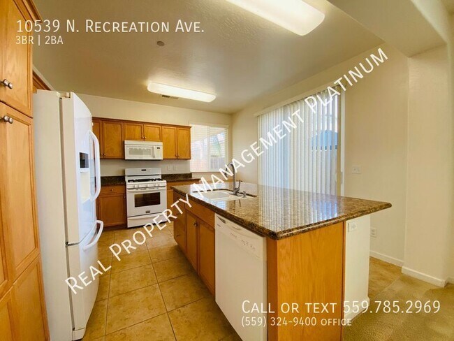 Building Photo - 10539 N Recreation Ave