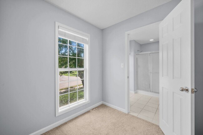 Building Photo - Stunning Stone Fireplace • Finished Basement • Fenced Yard