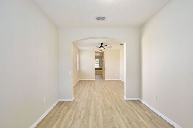 Building Photo - Water-View 4BR/3BA with 3-Car Garage in Gated North Shore - Near Lake Nona & Medical City