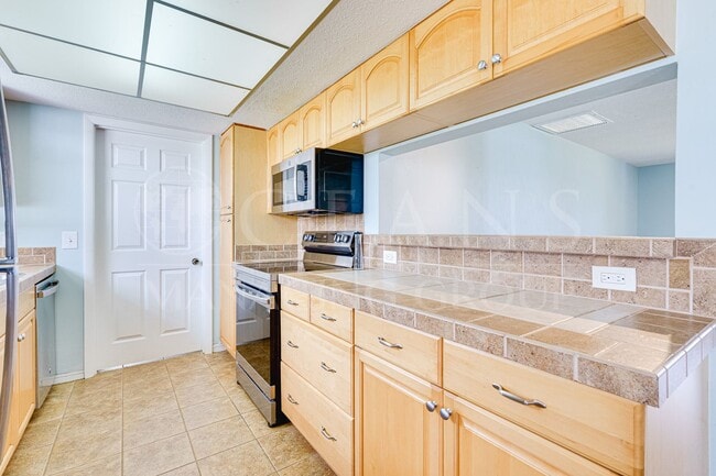 Building Photo - Welcome to your Perfect Beachside Retreat!