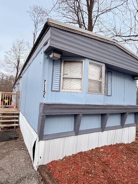 Building Photo - 7115 Timber Ridge Center