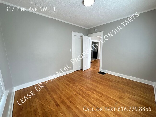 Building Photo - Updated lower 2 bedroom on the West side o...