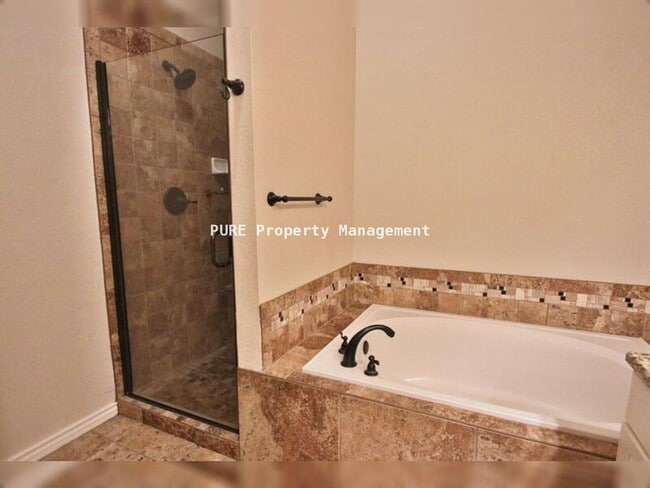 Building Photo - Large patio home with partially finished basement, attached 2-car garage!