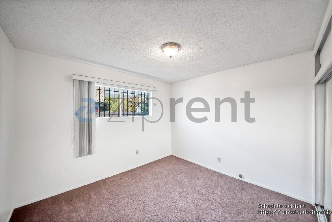 Building Photo - 2458 Normandie Ave