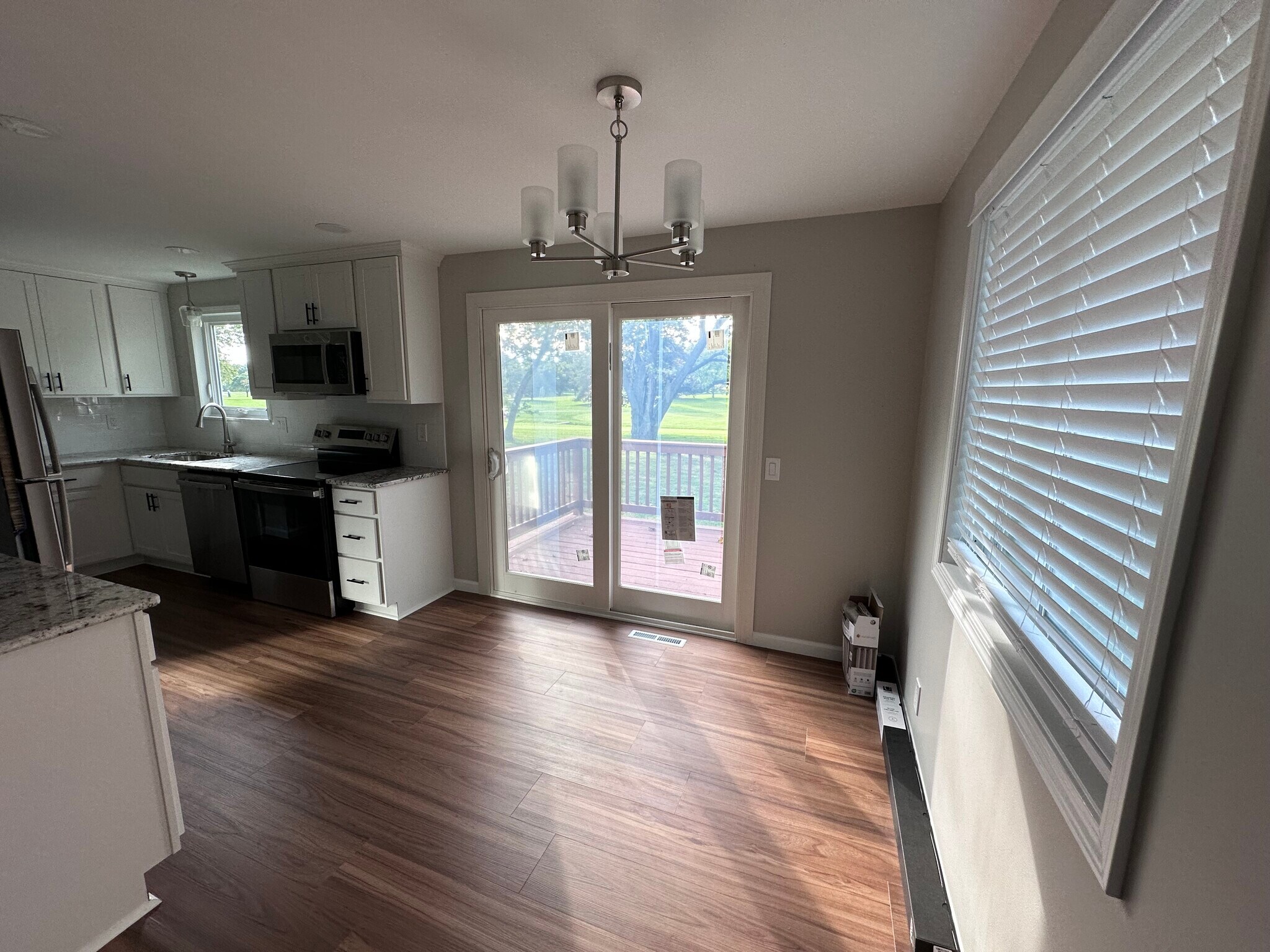 Dining area with sliding door leading to deck - 2311 Baird Rd