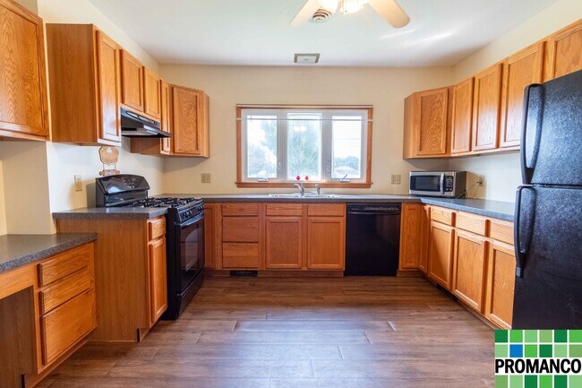 Building Photo - Discover the Perfect Blend of Residential ...