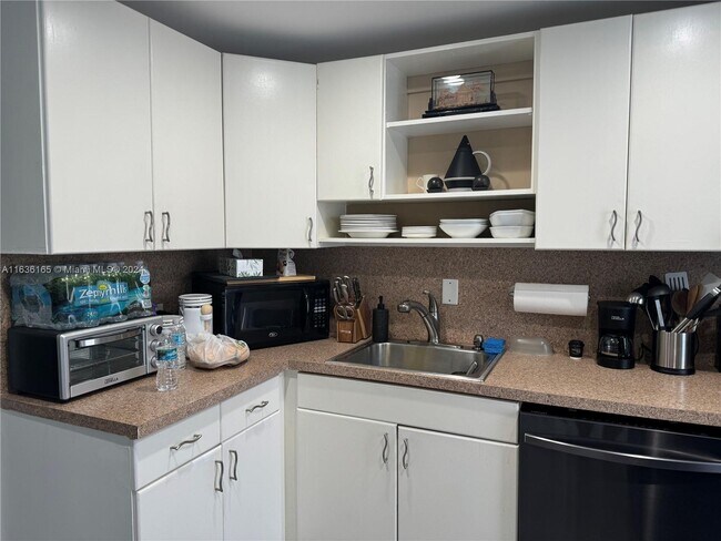 Building Photo - 8956 Collins Ave