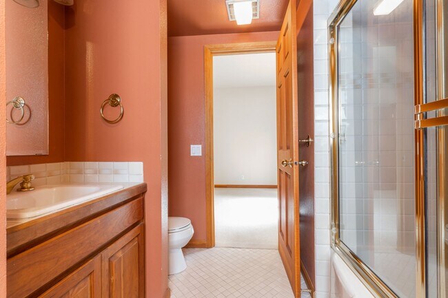 Building Photo - Private river access and stunning views from this home on Harmon Blvd! + Bonus Room