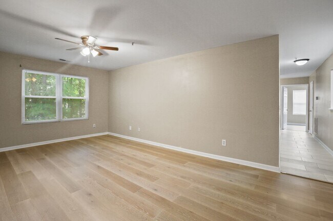 Building Photo - Spacious Three-Bedroom Condo with In-Unit Laundry