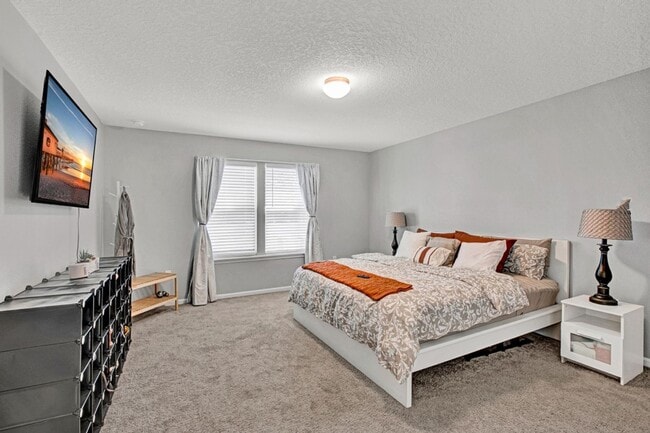 Building Photo - Move-In Ready 4BR Home. Split Floor Plan. 2-Car Garage & Pet Friendly!