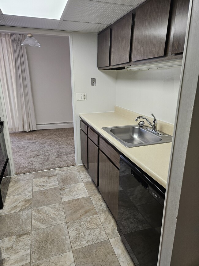 B15 Kitchen- Entry Side - Lake Club Apartments