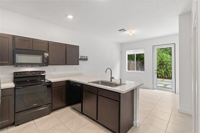 Building Photo - 1385 NW 208th Terrace