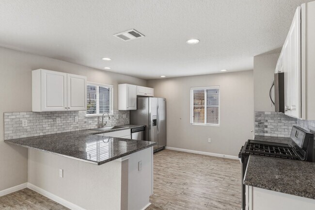 Building Photo - Gated Community Home with Solar Panels & All Appliances Included