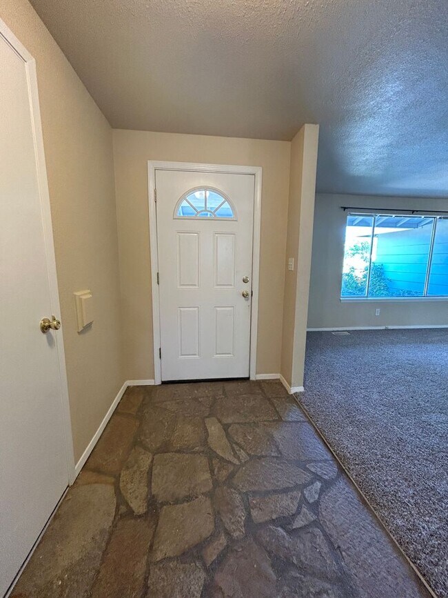 Building Photo - Corner Lot Home w/ Giant Yards, Covered Patio & Minutes to Boise Spectrum Center!