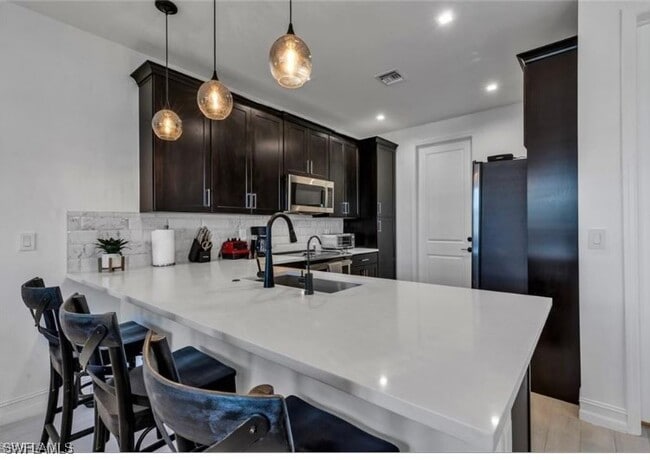 Building Photo - 7580 Carnegie Way