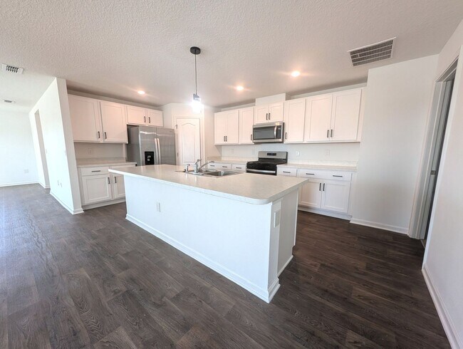 Building Photo - ENTRADA SUBDIVISION - THIS 4/2/3 HOME WITH OVER 2,140 sqft AND FENCED REAR YARD IS NOW AVAILABLE!!