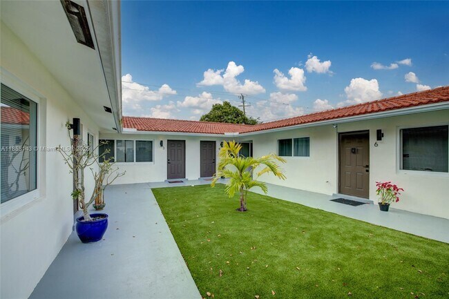 Building Photo - 1750 NE 56th Ct