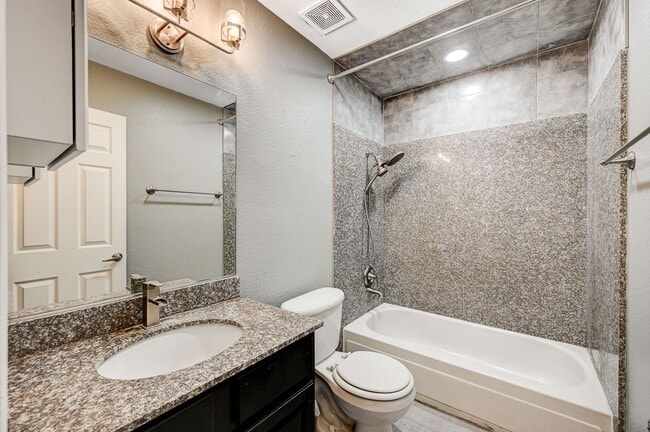 Building Photo - GATED COMMUNITY CONDO WITH BRAND NEW UPGRA...