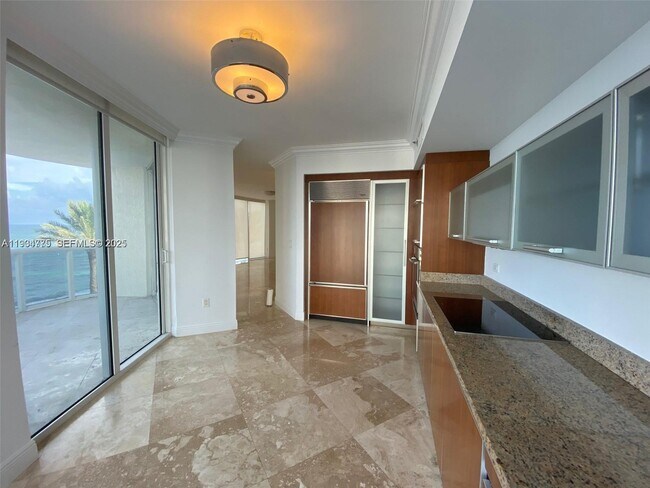 Building Photo - 17201 Collins Ave