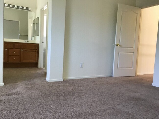 Building Photo - Three bedroom in gated community.