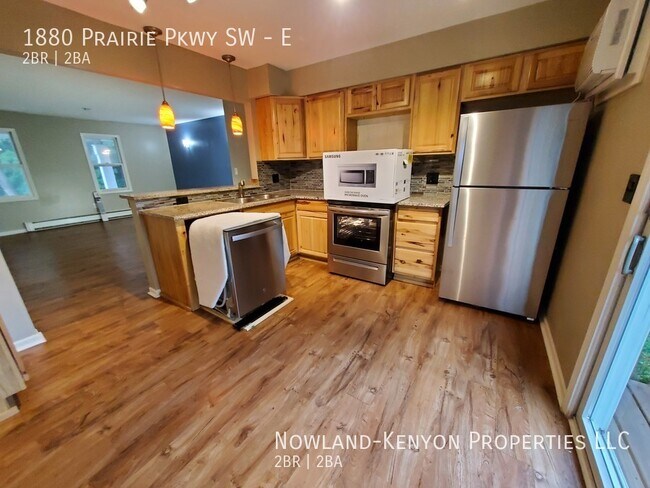 Building Photo - 1880 Prairie Pkwy SW - E- 2 beds, 1 full bath