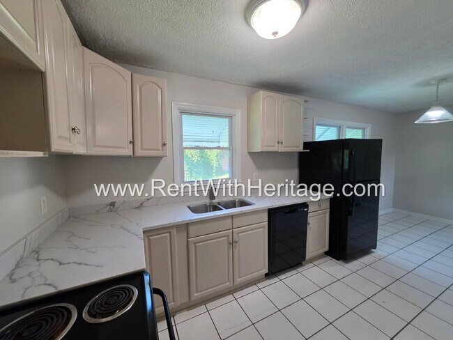 Building Photo - 5990 Peco Ln