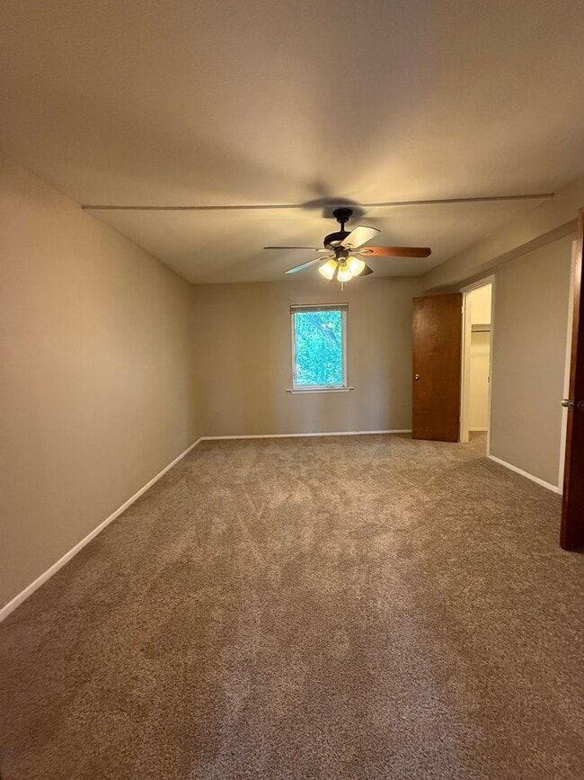 Building Photo - 1/1 NEW FLOORING ON-SITE LAUNDRY FACILITY-...