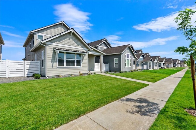 Building Photo - Brand New, Stylish 4-Bedroom Home with Vaulted Ceilings and Private Patio