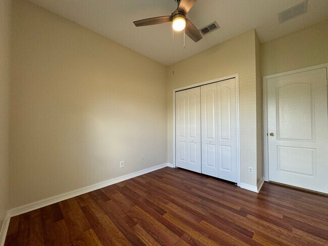 Building Photo - Beautiful 3/2 home near Lake Nona ~ Fenced In Yard ~ LVP & Tile Flooring ~ Community Pool!