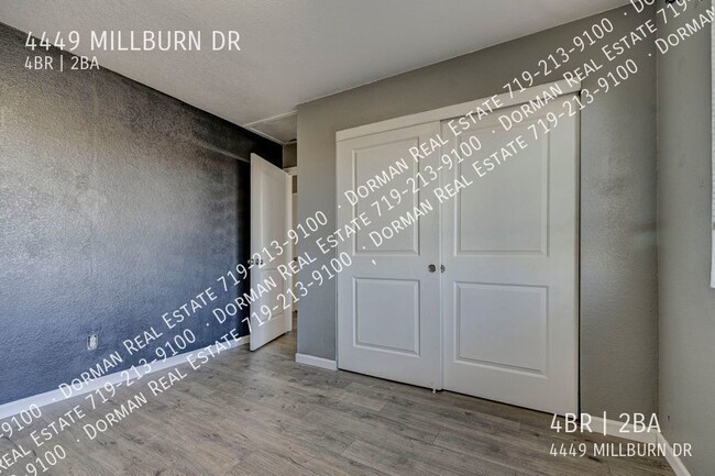 Building Photo - Four bedroom home close to Ft. Carson, Lar...