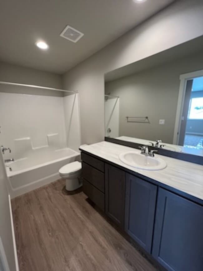 Building Photo - 3 bed/2 bath rambler style home! Attached garage, fenced back yard & A/C!