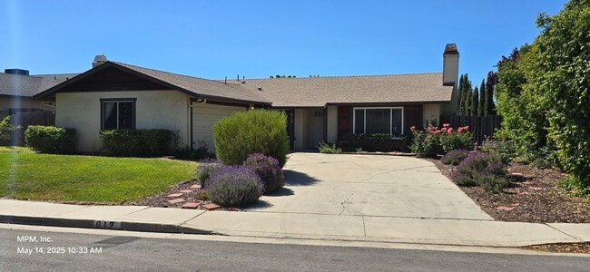 Primary Photo - 4 Bedroom 2 bath home with 2 car garage, y...