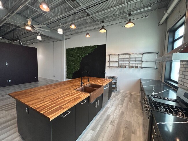 Building Photo - Industrial Style. Downtown Energy. Elevated Living.