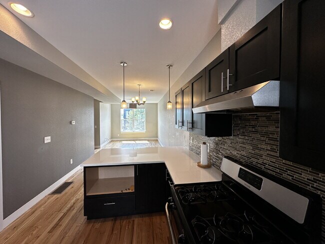 Building Photo - "Experience Modern Comfort: Spacious 2-Bed...