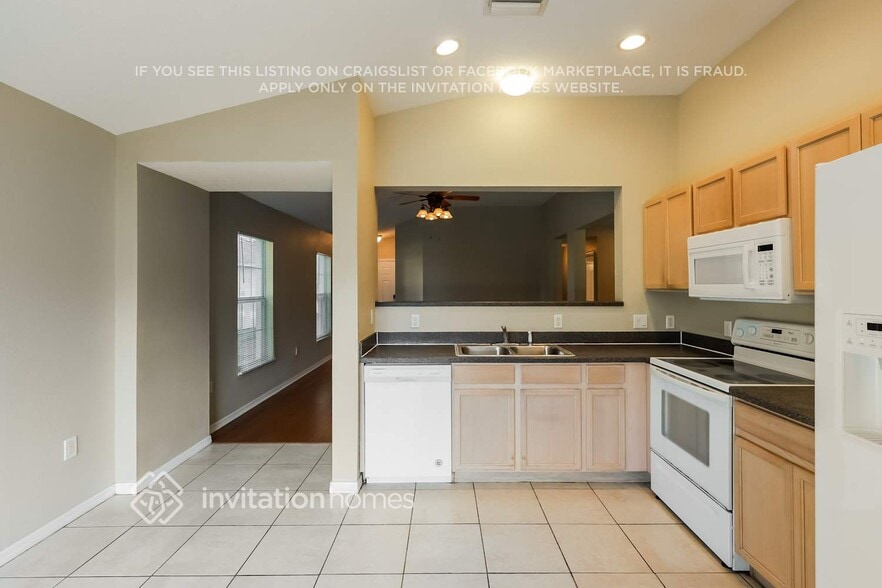 Building Photo - 11916 Mango Groves Blvd