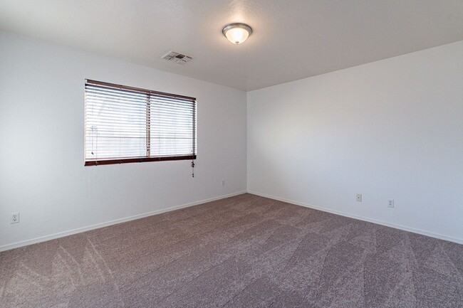 Building Photo - Three bedrooms! Fresh Carpet and Paint!