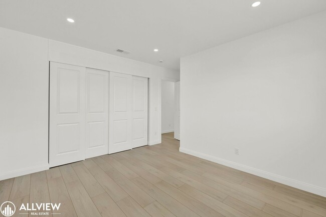 Building Photo - Fully Renovated 4-Bedroom Home with Firepl...