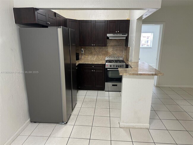 Building Photo - 1280 W 54th St