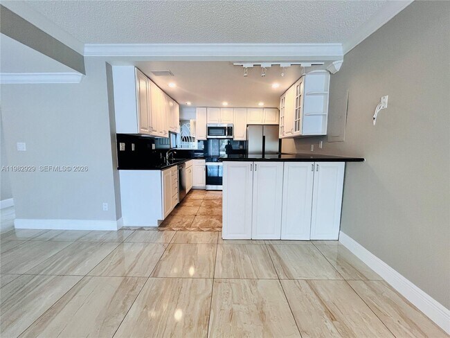 Building Photo - 253 Poinciana Island Dr