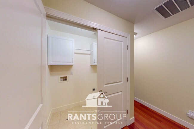 Building Photo - Meticulously Updated Townhome in Gated Community – Low Maintenance & Move-In Ready!